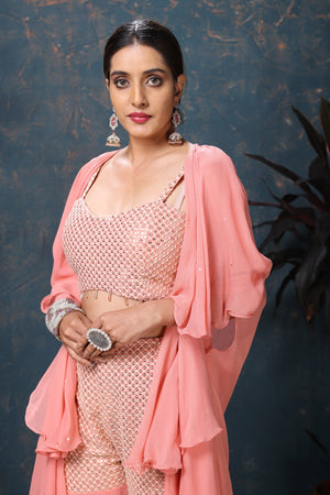 Shop gorgeous peach embroidered three piece palazzo suit online in USA with cape. Flaunt Indian style at parties and weddings in beautiful designer dresses, salwar suits, Anarkali suits, gowns, palazzo suits from Pure Elegance Indian fashion store in USA.-closeup